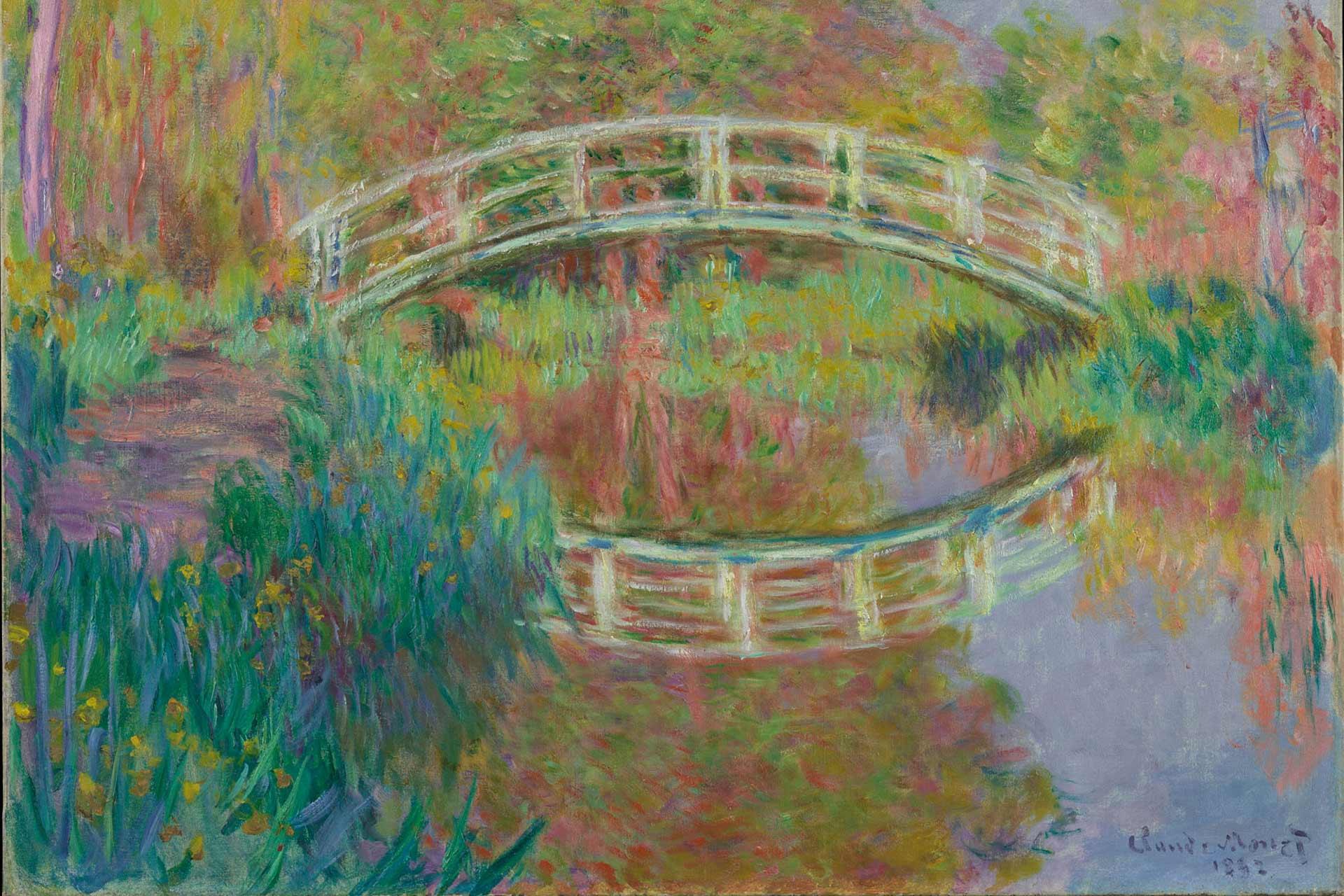 An impressionist painting of a curved wooden bridge over a pond, surrounded by lush green, pink, and purple foliage, with the bridge and plants reflected in the calm water below.